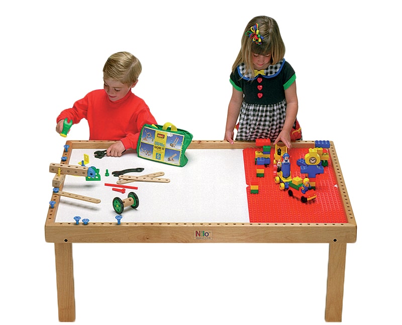 Boy and girl playing with Nilo Hammer'N Nails Set and Duplo blocks on Nilo childrens play table.