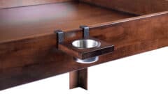 The nilo wine glass holder shown mounted on the Nilo master table in dark walnut stain
